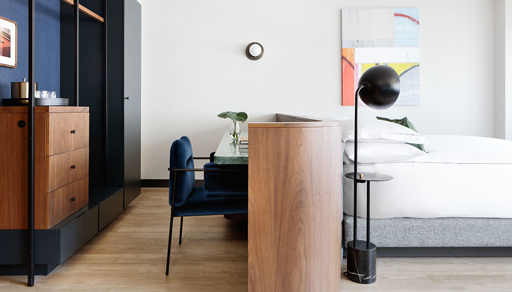 Banneker guestroom with desk and dresser