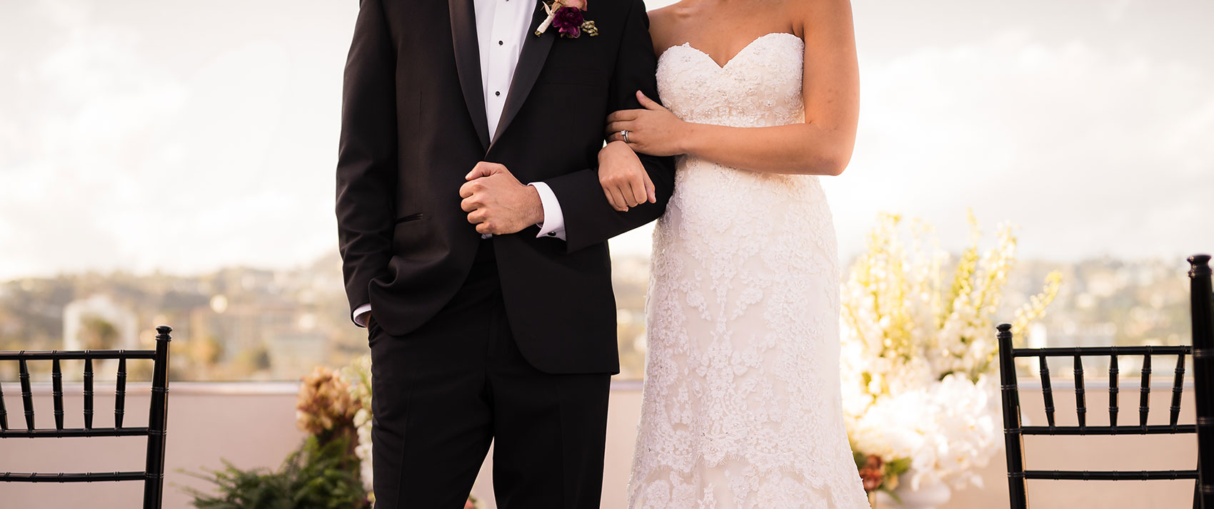 bride and groom on rooftop